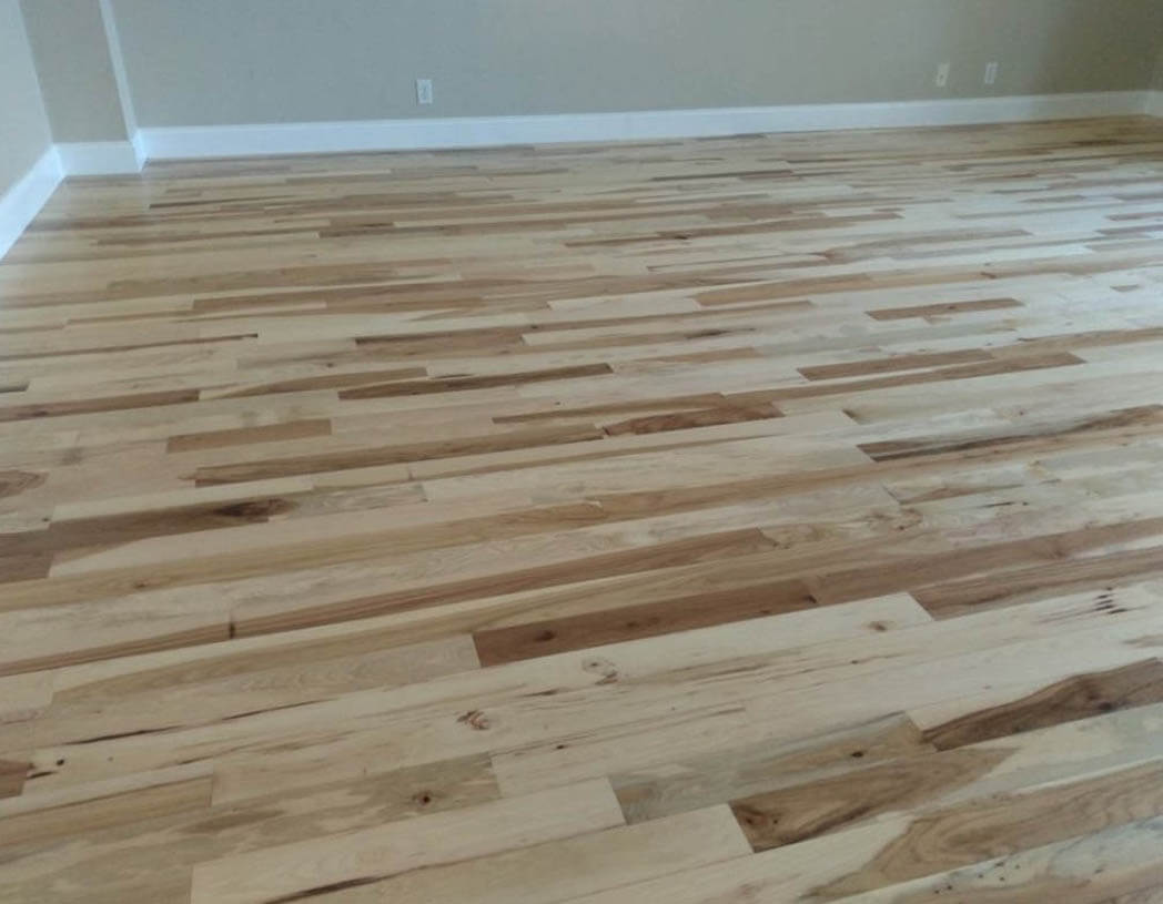 maple floors with variation light and dark installed in Travis County