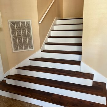 gray laminate floor installed by Austin Hardwood Flooring