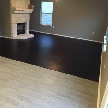 gray laminate floor installed by Austin Hardwood Flooring