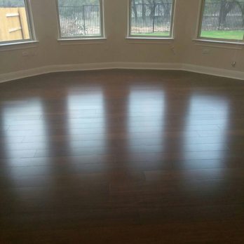 gray laminate floor installed by Austin Hardwood Flooring